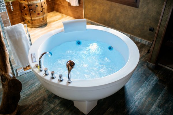 Modern beautiful hydro massage bath with water